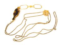 An Antique Tortoiseshell Lorgnette and Gold Slide Pendant, 30.80 dwts.