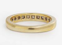 An 18K Yellow Gold and Diamond Band by Tiffany & Co.