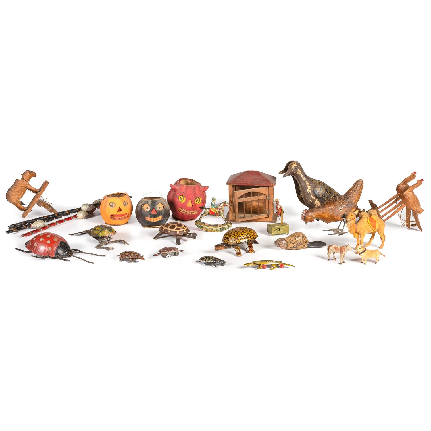 A Collection of Tin and Wooden Toys