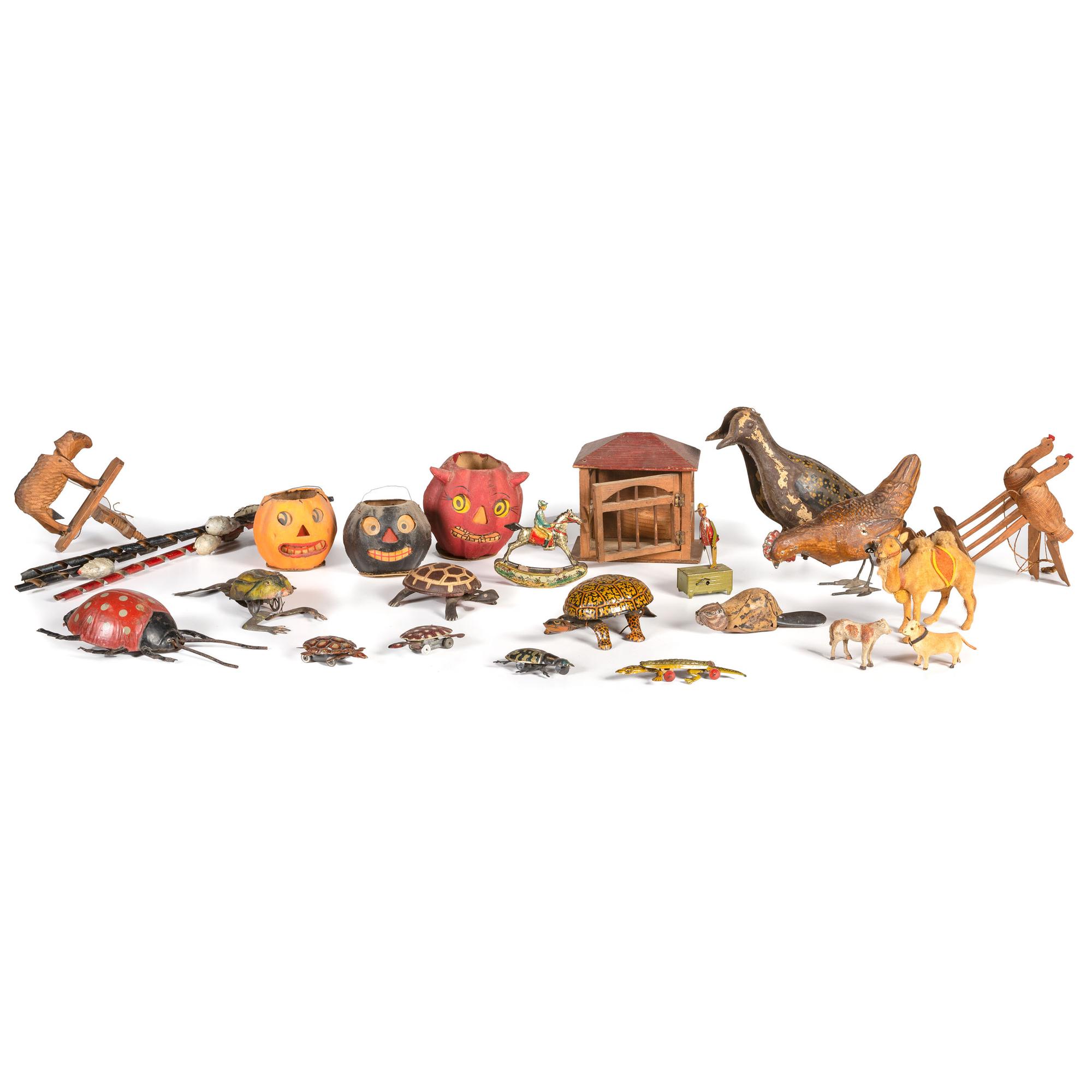 A Collection of Tin and Wooden Toys