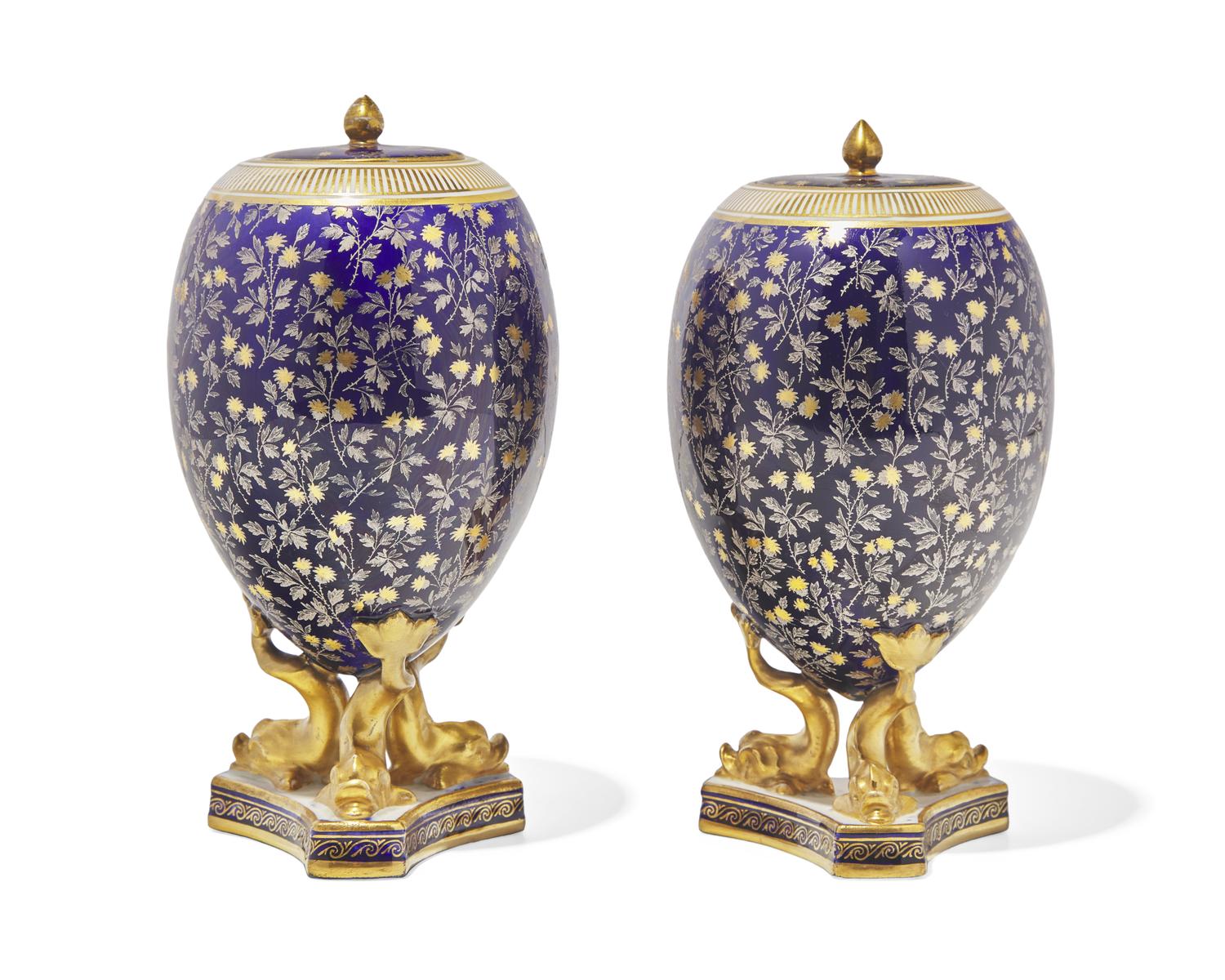 A Pair of Wedgwood Parcel Gilt Porcelain Covered Urns