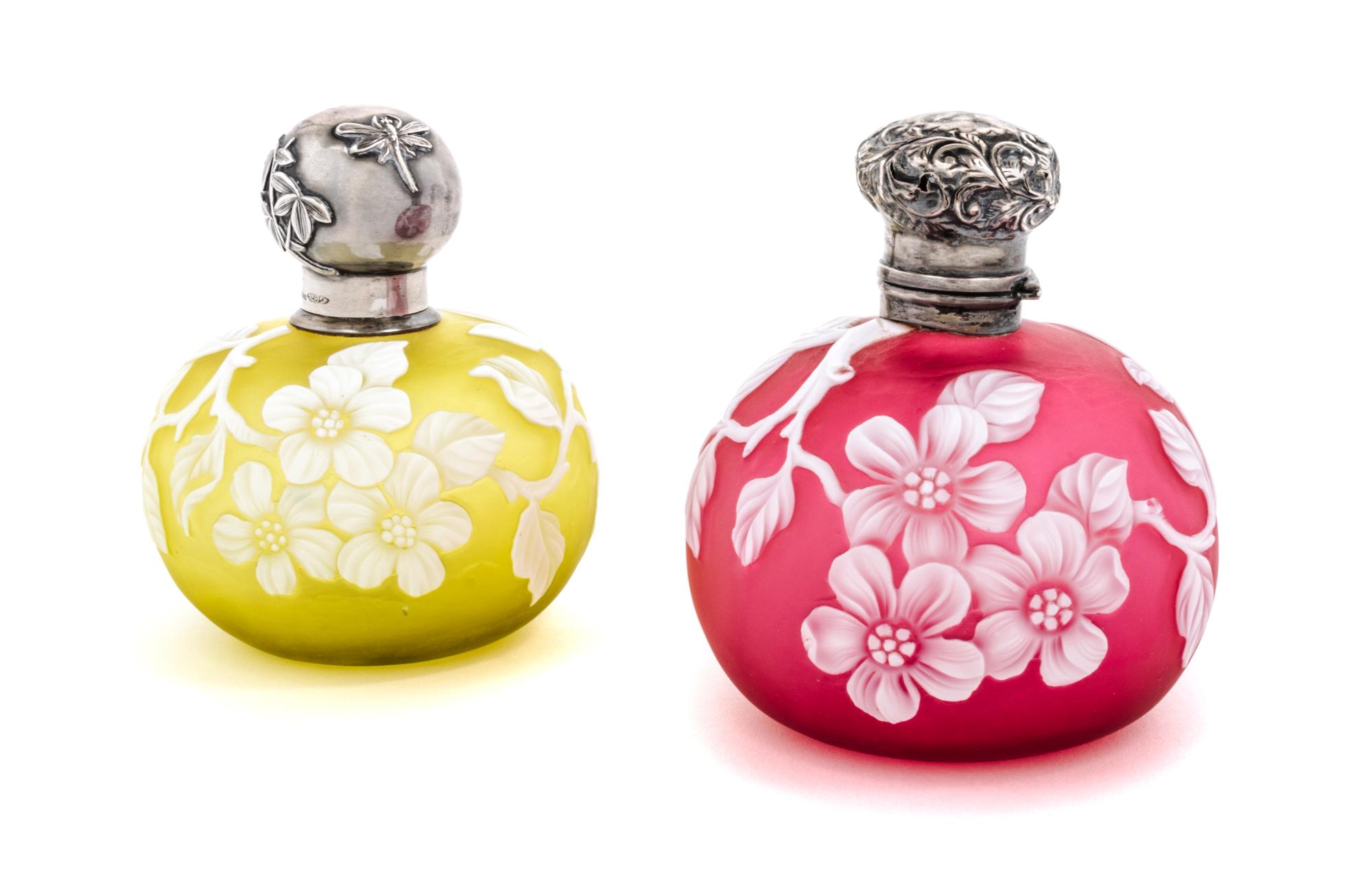 English, LATE 19TH CENTURY, two silver mounted cameo glass bottles, each of spherical form with floral decoration, the taller with rubb