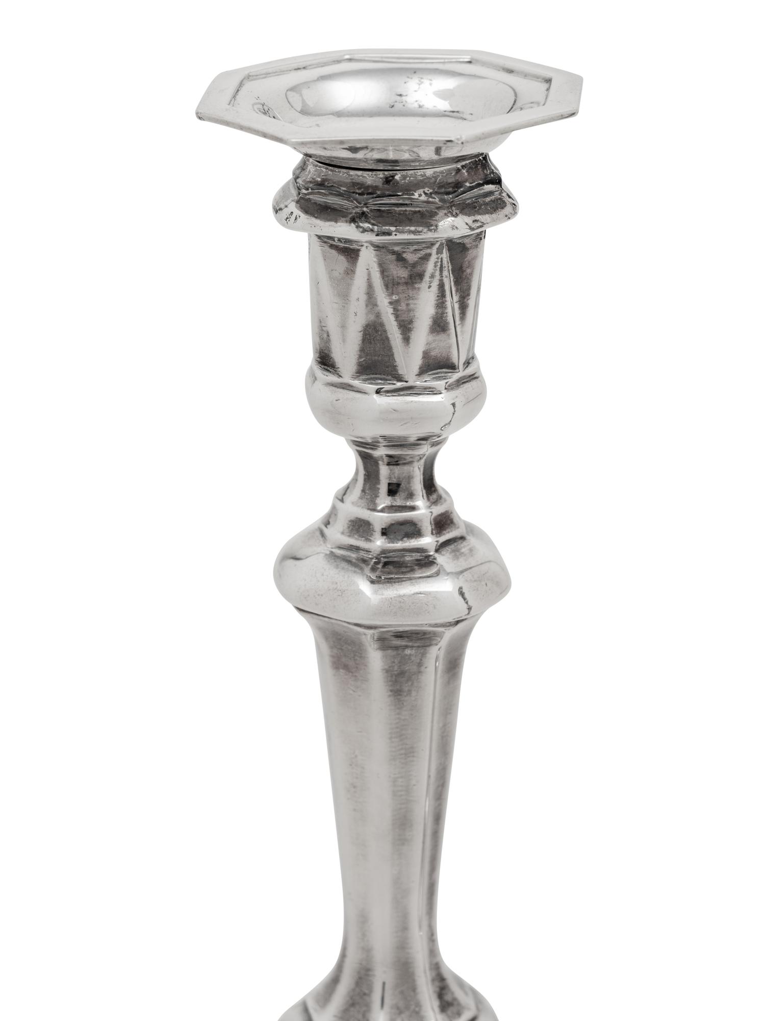A Pair of Queen Anne Britannia Silver Candlesticks