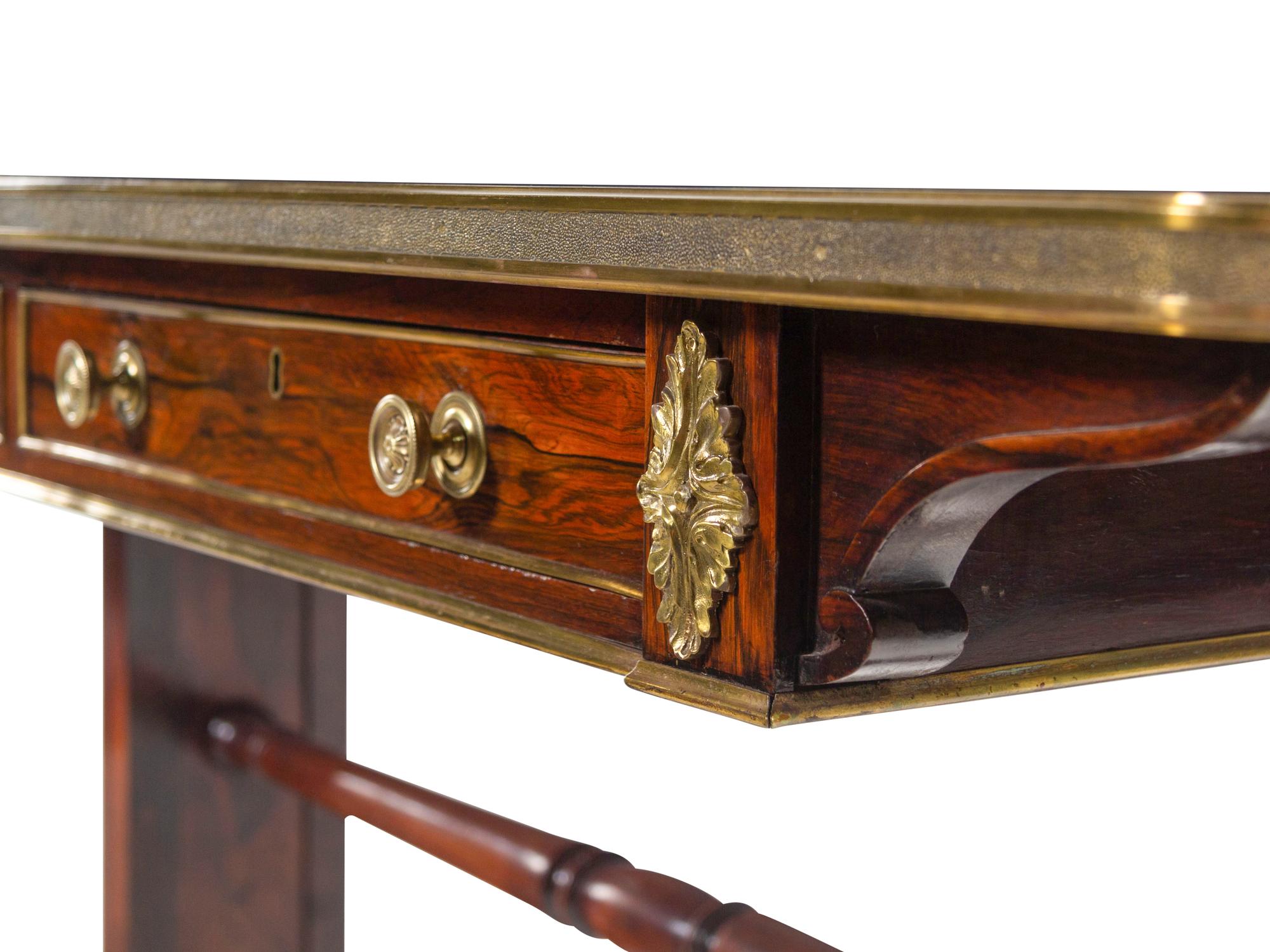 A Regency Gilt Bronze Mounted Rosewood Sofa Table