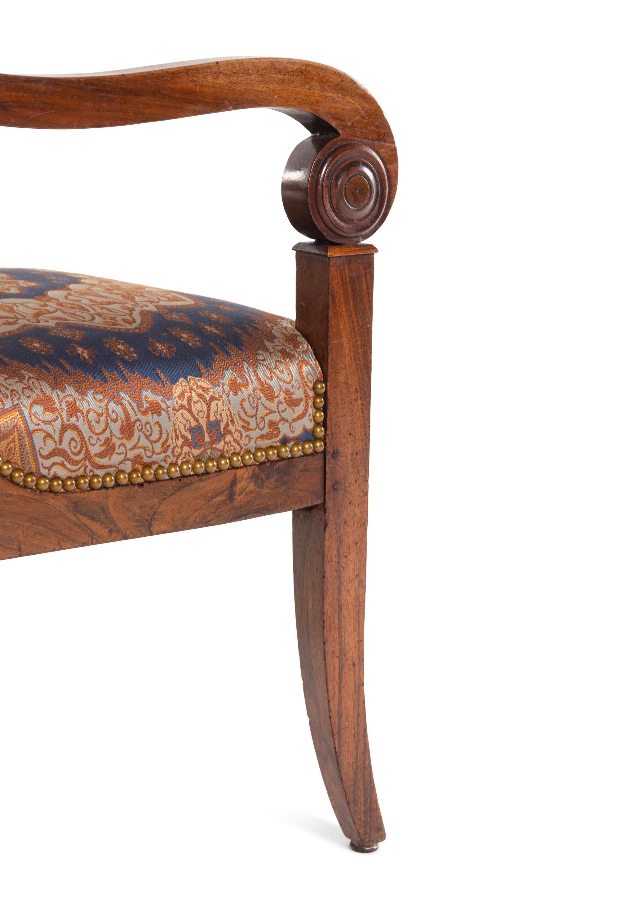 A Pair of Louis Philippe Style Mahogany Fauteuils