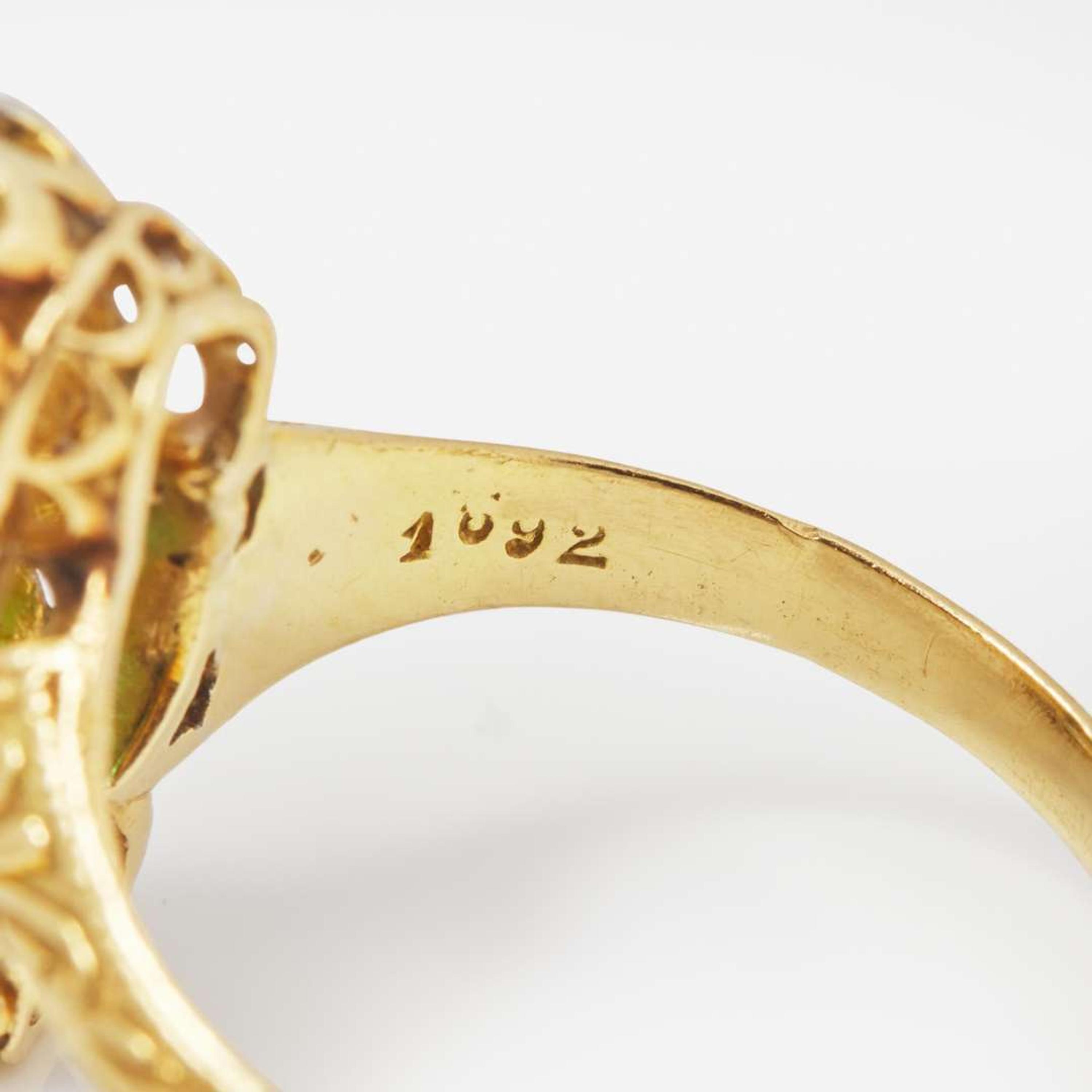 A Three-Stone 14K Yellow Gold, Emerald, and Diamond Ring Victorian, c.1900