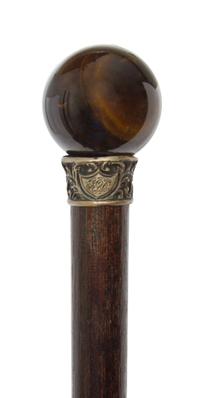 An American Handled Walking Stick, Diameter of handle 1 1/2 x length overall 34 5/8 inches.