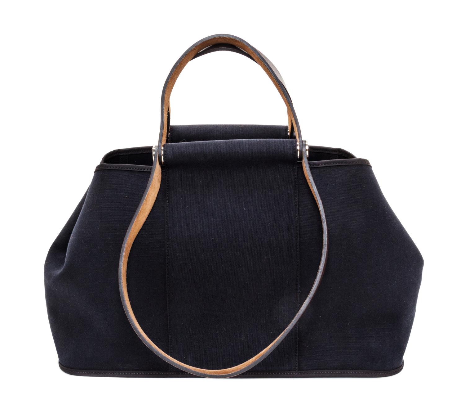 An Hermes Black Canvas Cabag Elan Tote, 10" x 14" x 5.5".