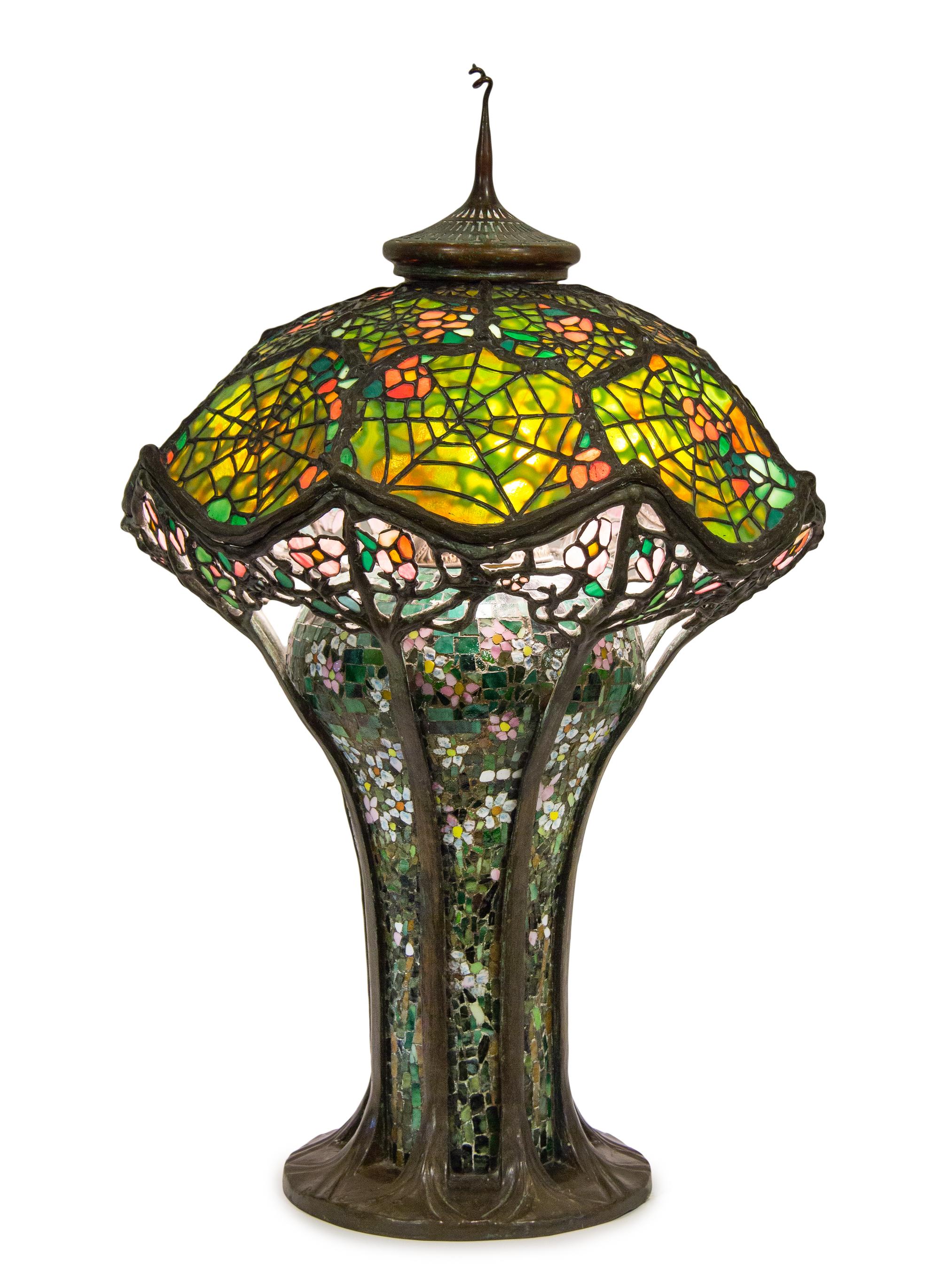 An American Leaded Glass and Bronze Table Lamp Diameter of shade 21 inches.