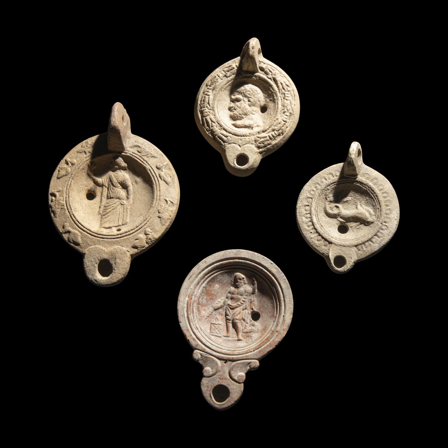 Four Roman Terracotta Lamps