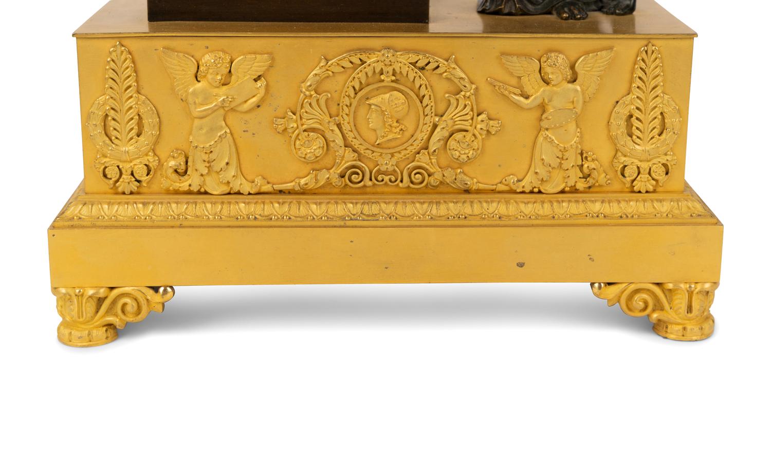 A French Gilt and Patinated Bronze Figural Mantel Clock