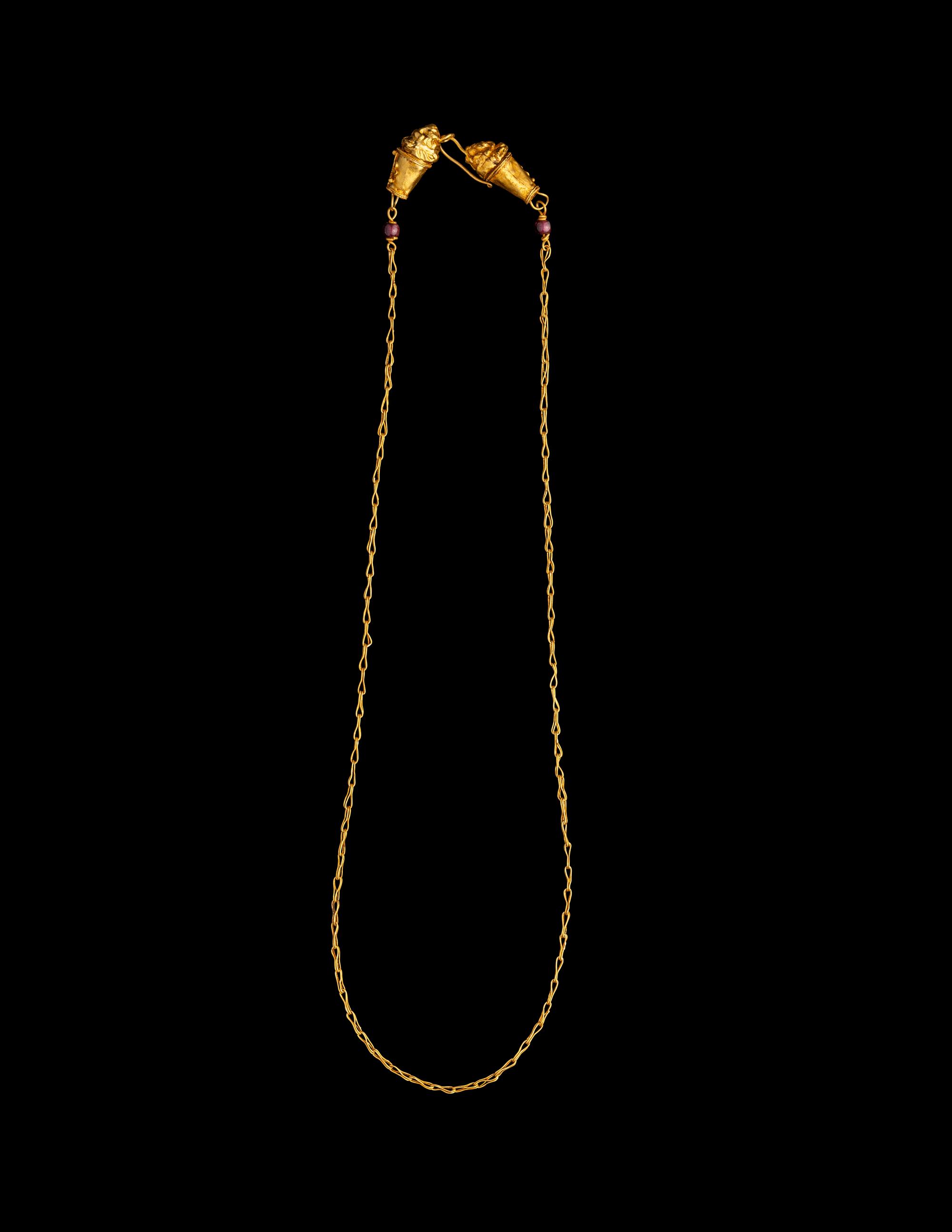 A Hellenistic Gold Necklace with Lion-Headed Terminals