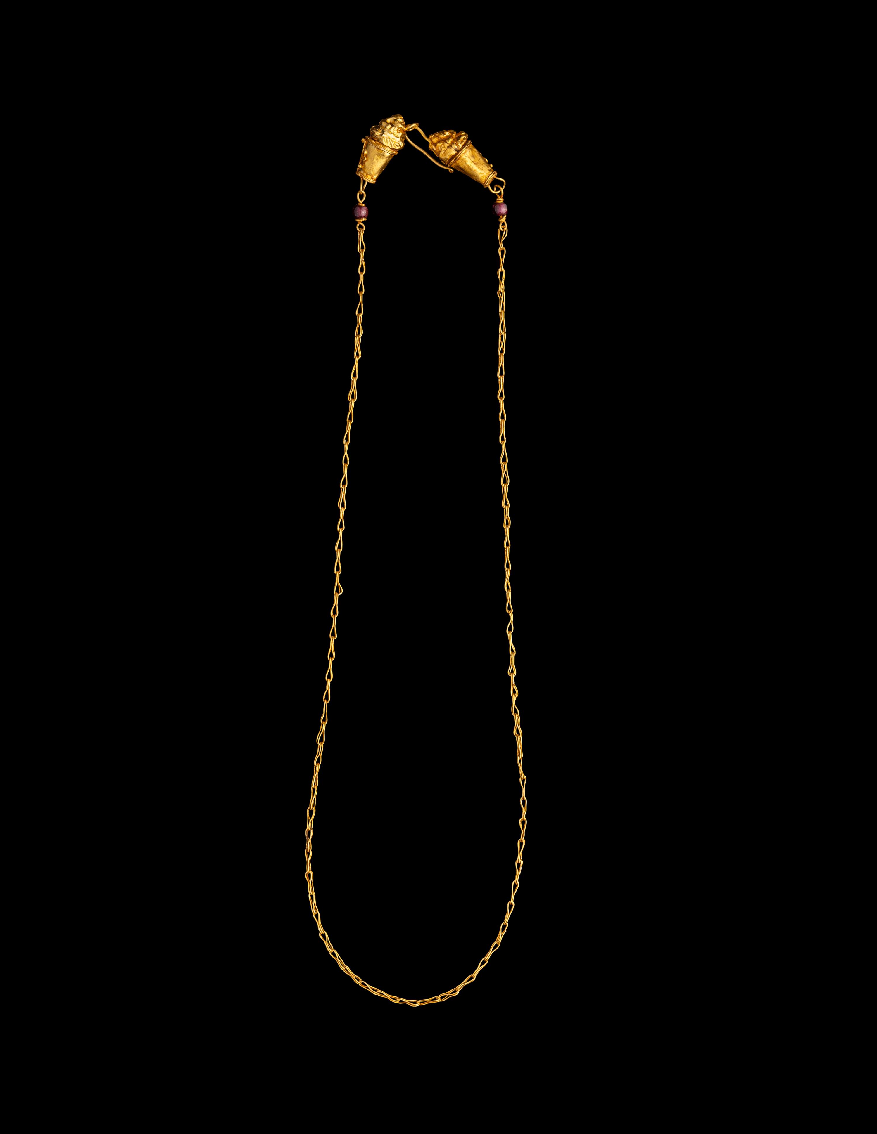 A Hellenistic Gold Necklace with Lion-Headed Terminals