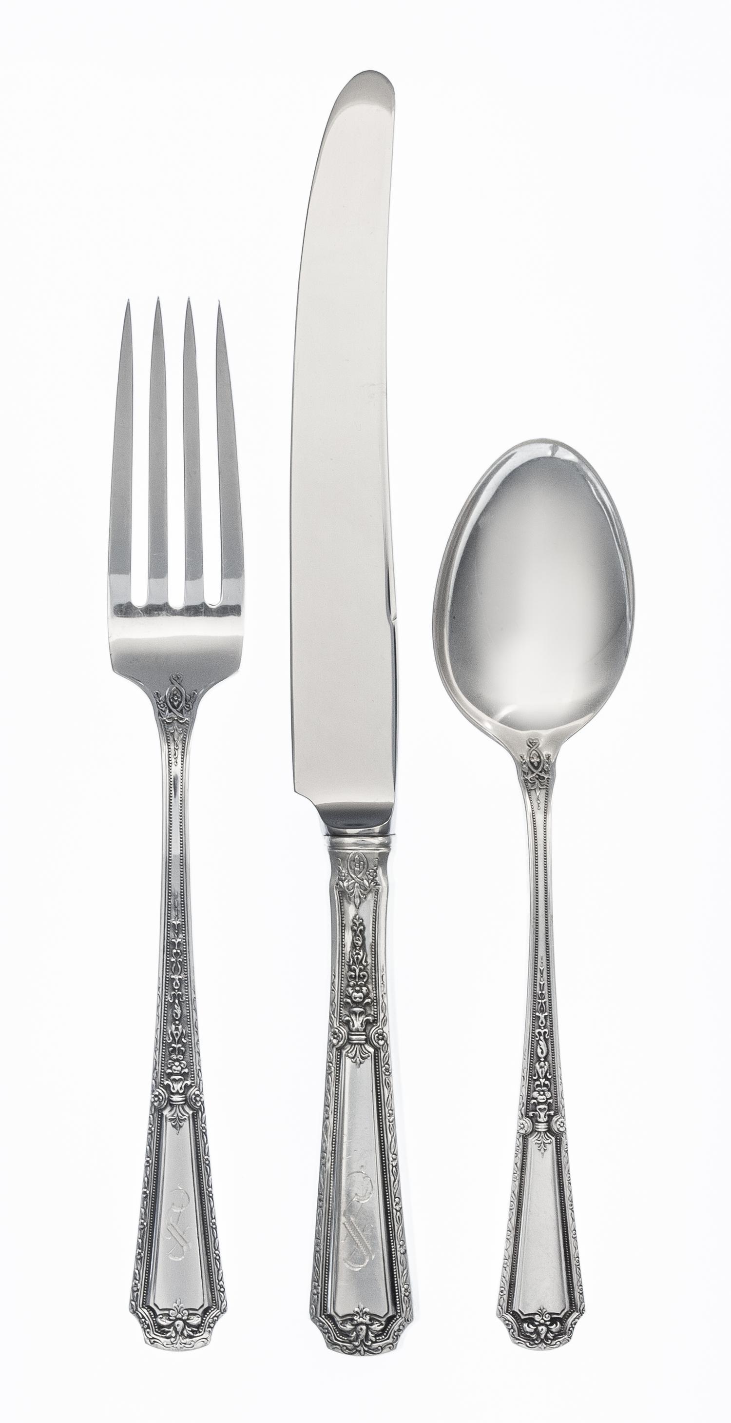 An American Silver Flatware Service, Towle Silversmiths, Newburyport, MA, Louis XIV pattern with a script S monogram, comprising: 12 di