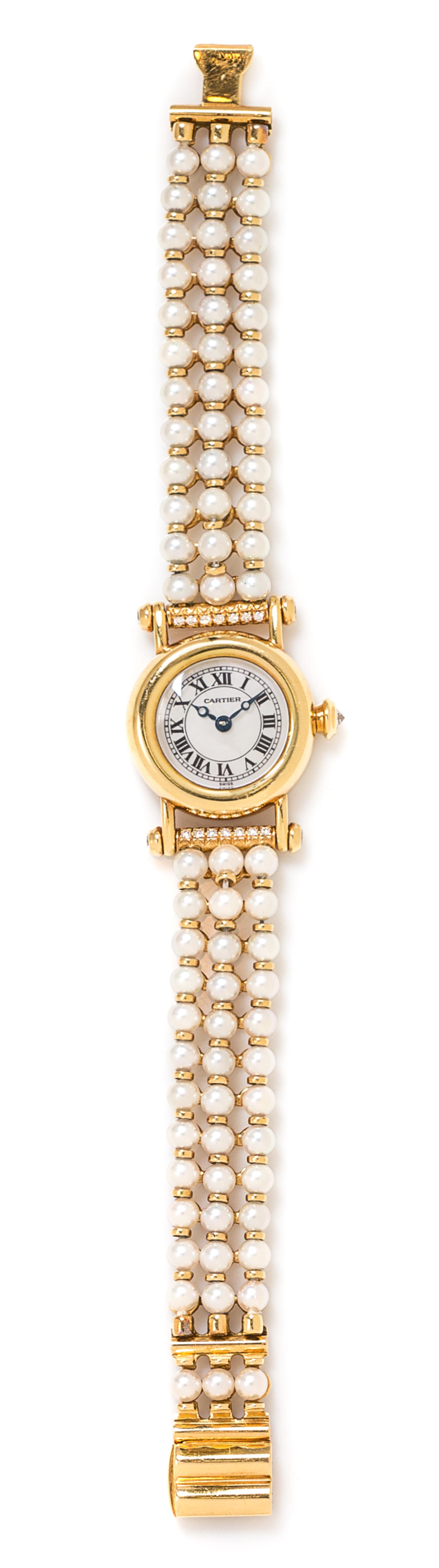 An 18 Karat Yellow Gold, Diamond and Cultured Pearl Ref. 1471 'Diabolo' Wristwatch, Cartier, 28.40 dwts.