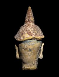 A Polychrome Stucco Head of a Temple Guardian
