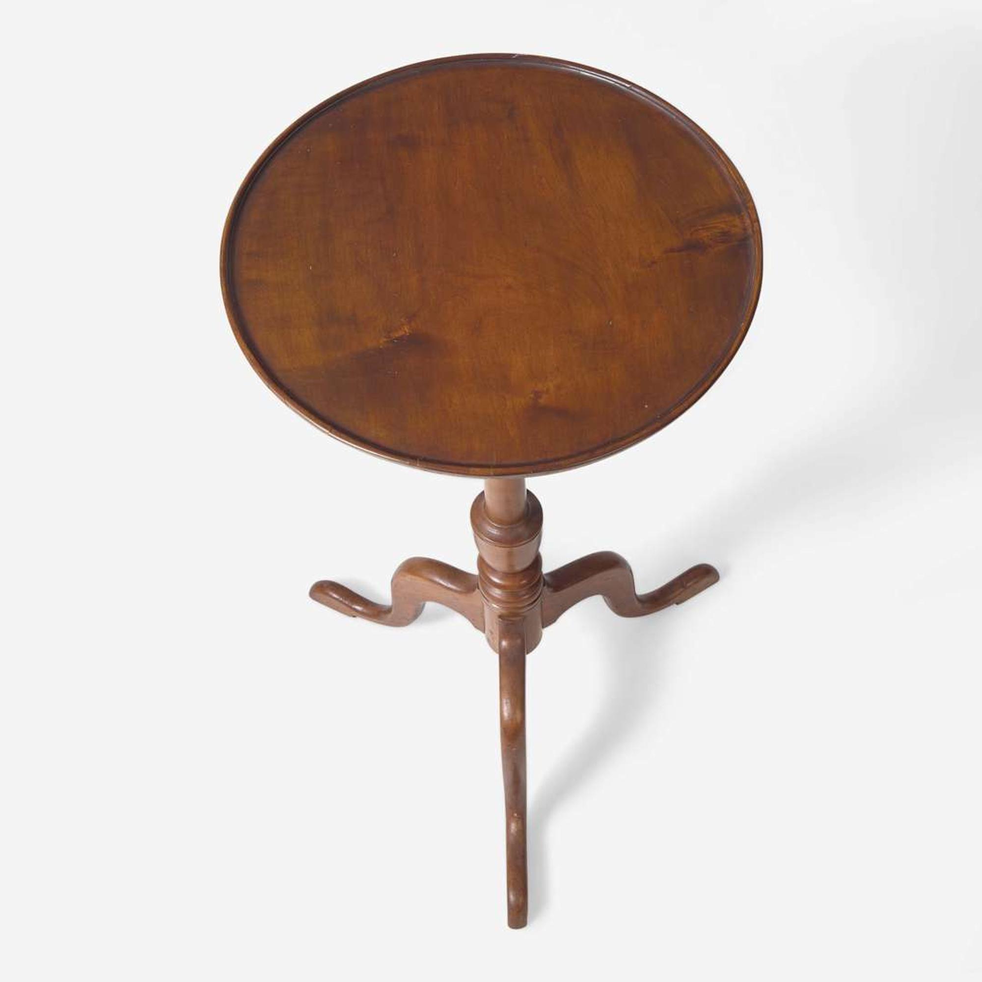 A Queen Anne carved mahogany candlestand late 18th century