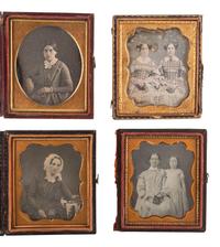 [EARLY PHOTOGRAPHY]. A group of 23 daguerreotypes featuring subjects posed with cased images, including: