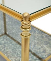 A Brass and Glass Cocktail Table