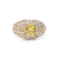 TREATED FANCY VIVID YELLOW DIAMOND AND DIAMOND RING