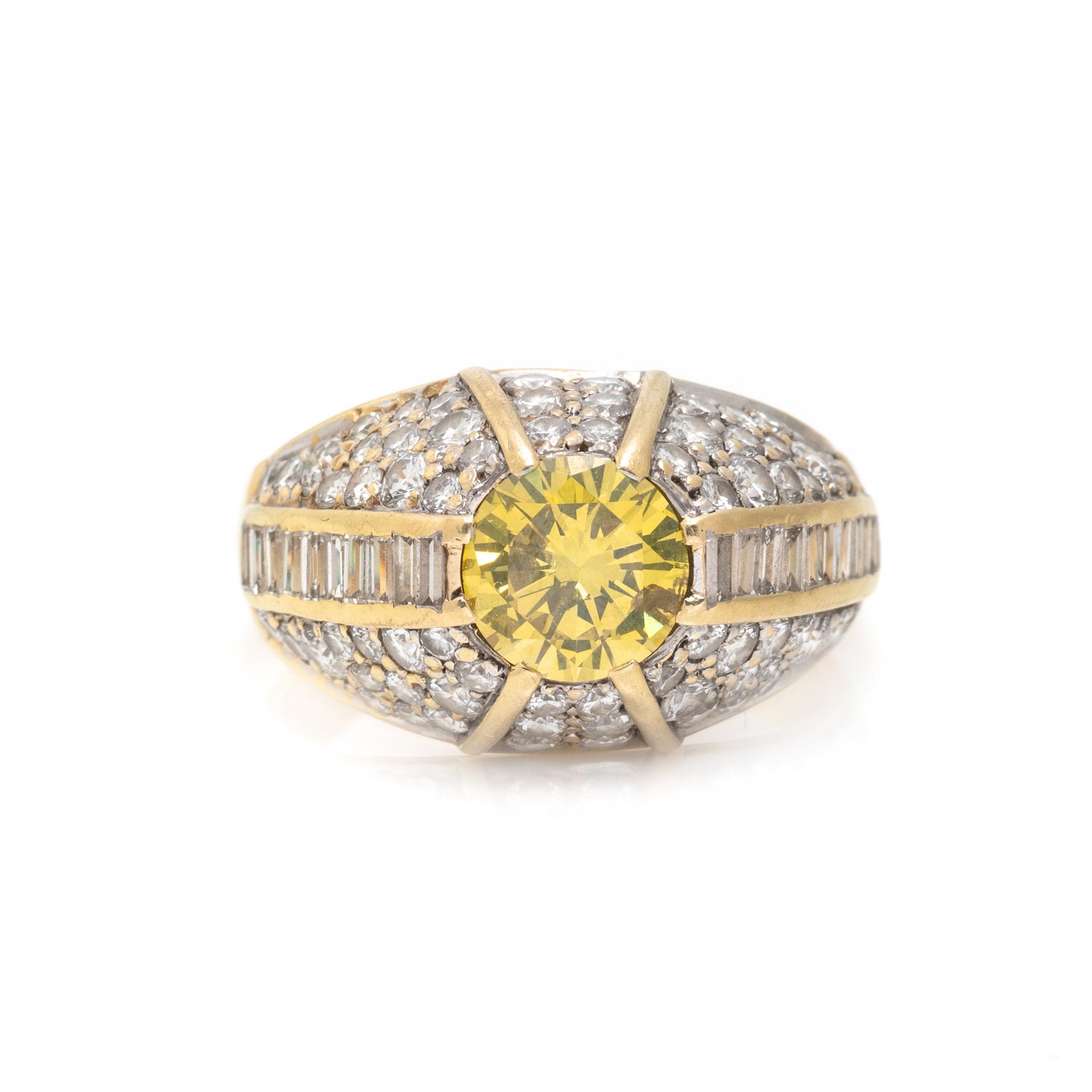 TREATED FANCY VIVID YELLOW DIAMOND AND DIAMOND RING