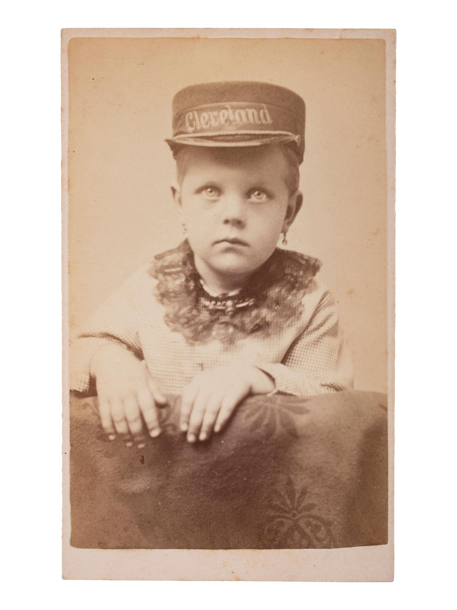 [1884 ELECTION]. A collection of cabinet cards and CDV from the 1884 election including portraits with Blaine or Cleveland ephemera, featuring a "Blaine and Logan" campaign building.
