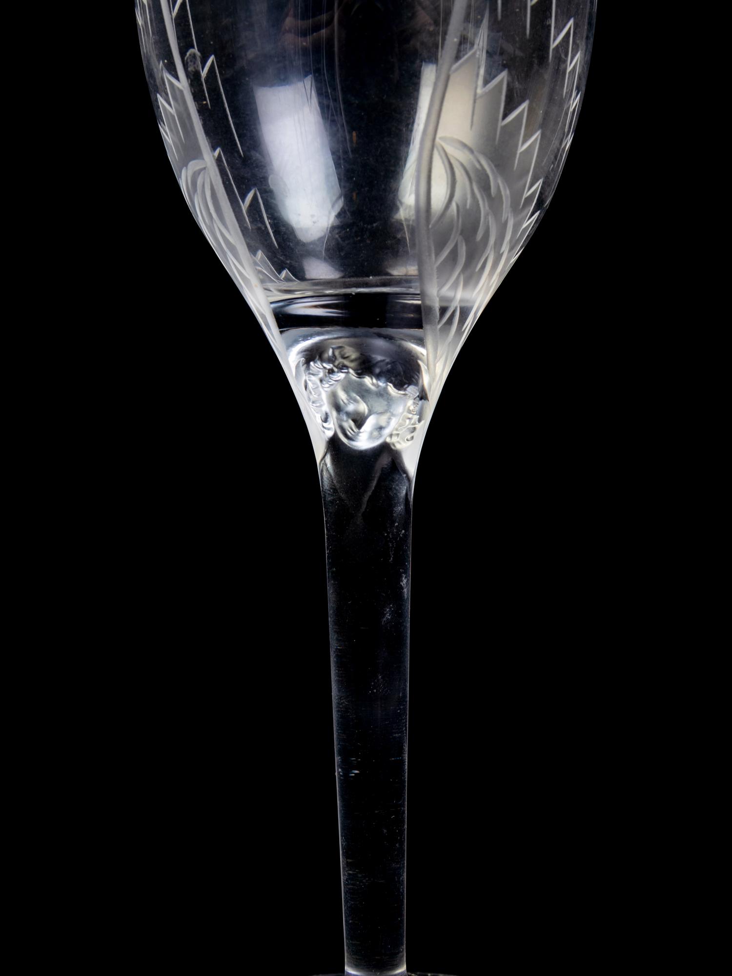 A Set of Twenty-Six Lalique Ange Glasses