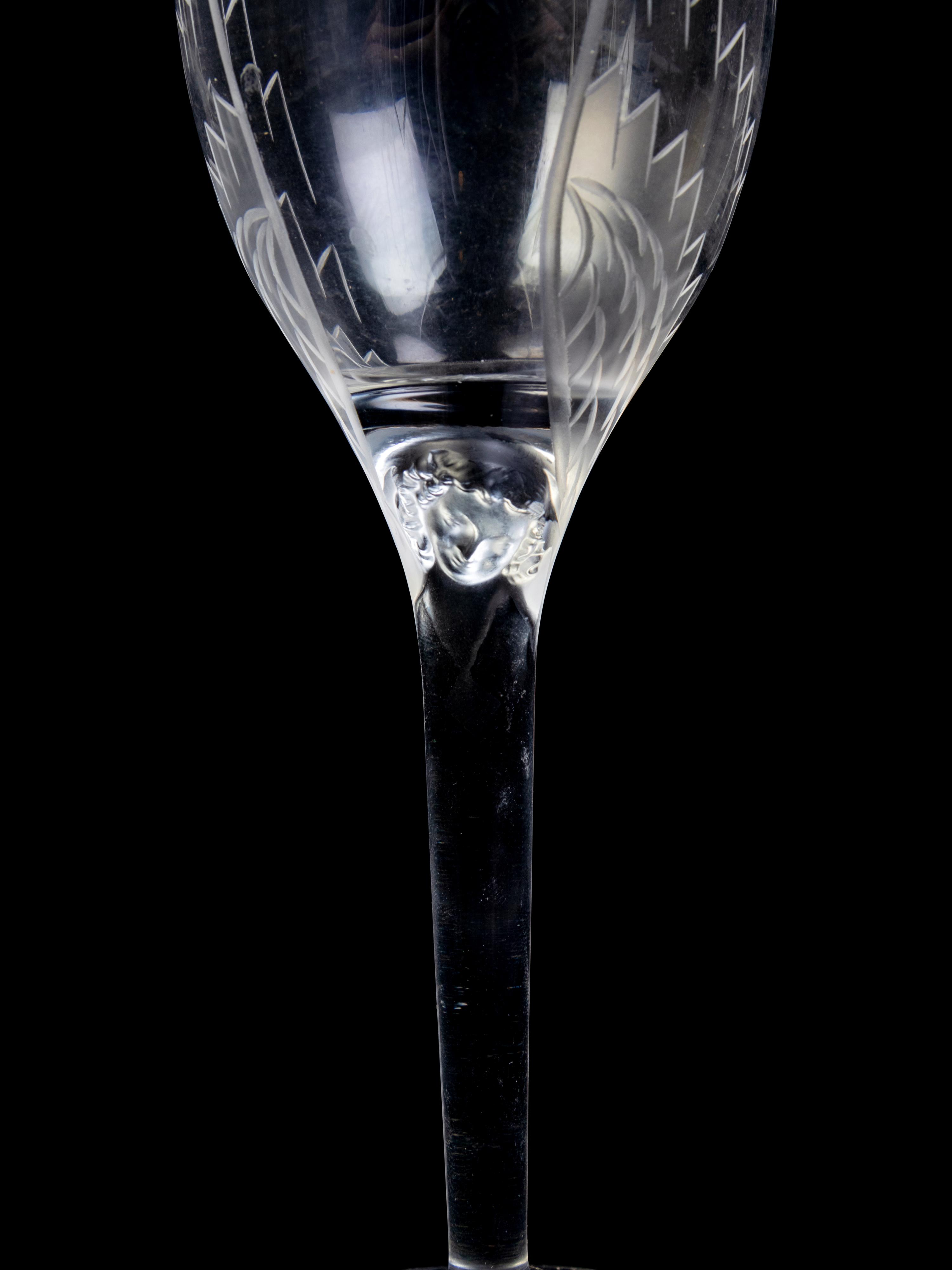 A Set of Twenty-Six Lalique Ange Glasses