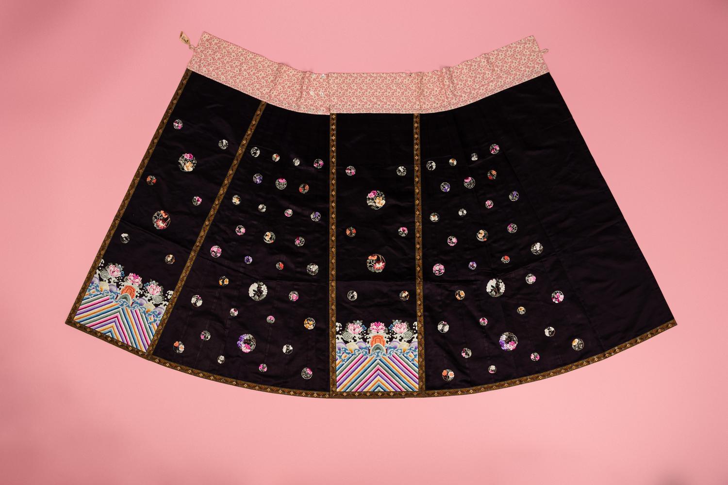 A Set of Aubergine Satin Ground Embroidered Silk Lady's Robe and Skirt