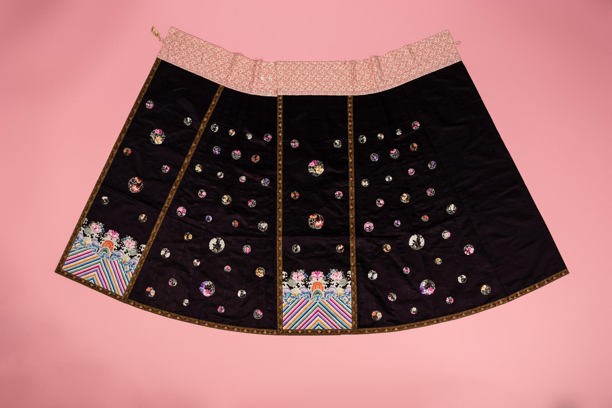 A Set of Aubergine Satin Ground Embroidered Silk Lady's Robe and Skirt