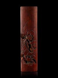 A Chinese Carved Bamboo 'Lotus and Crab' Wrist Rest