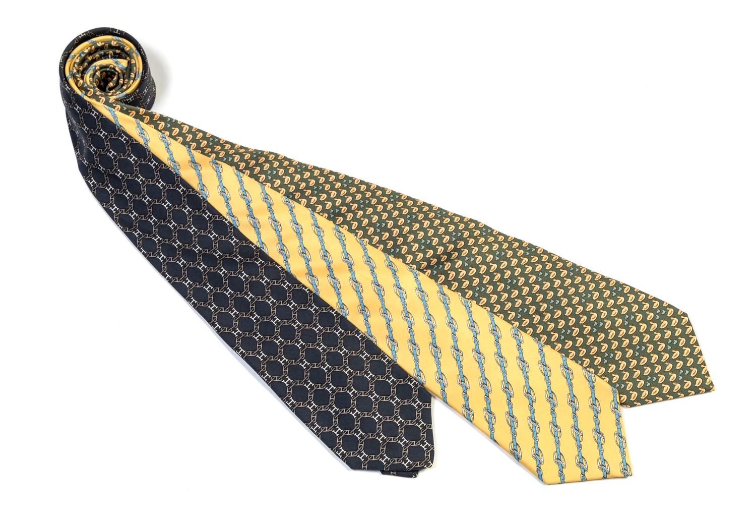 A Group of Three Hermes Silk Ties, 3.15" wide.