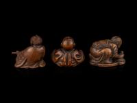 Three Japanese Carved Boxwood Figural-Form Netsuke