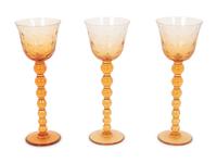 A Set of Fifteen St. Louis Amber Glass Stems