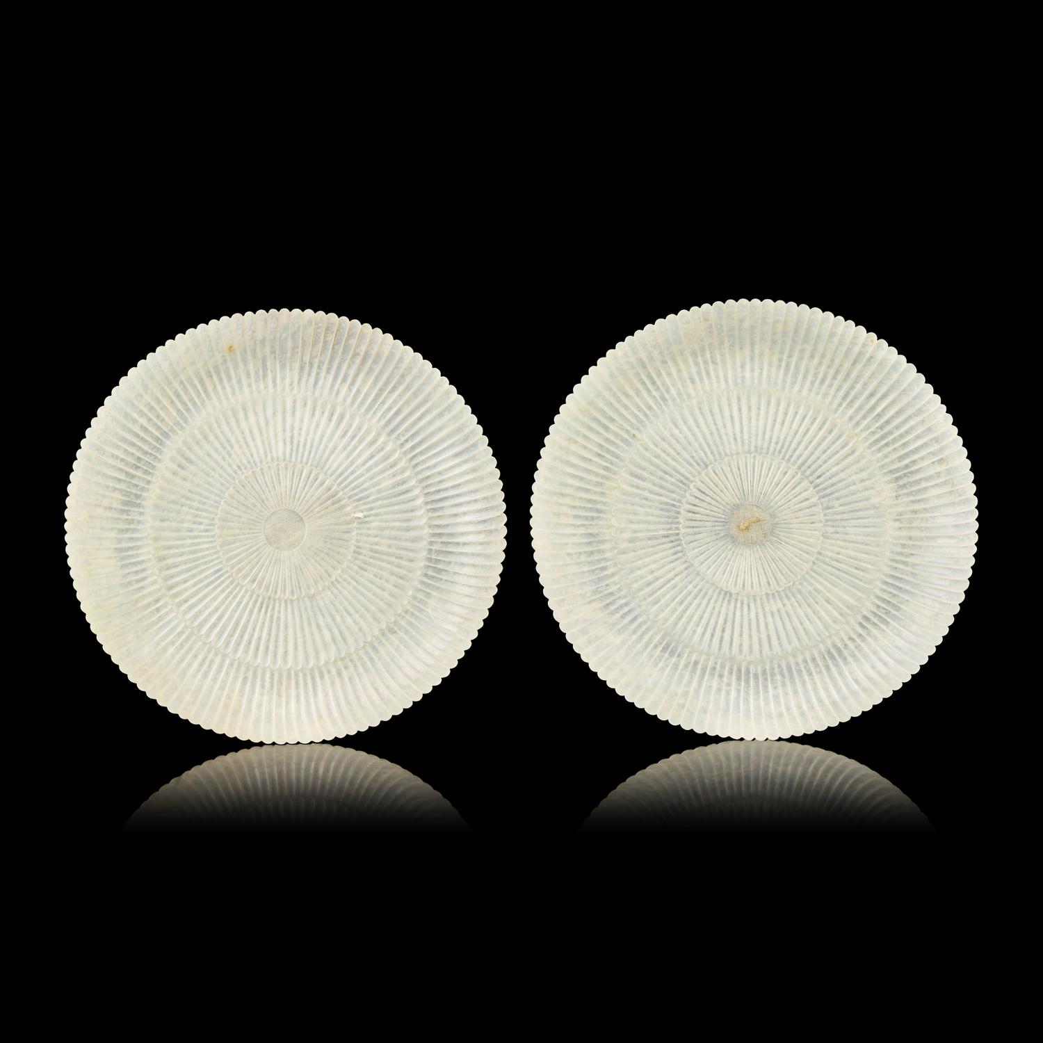 A Pair of Chinese White Jade 'Chrysanthemum' Dishes, Qing Dynasty to Republic Period 晚清-民國 白玉菊瓣盤一對