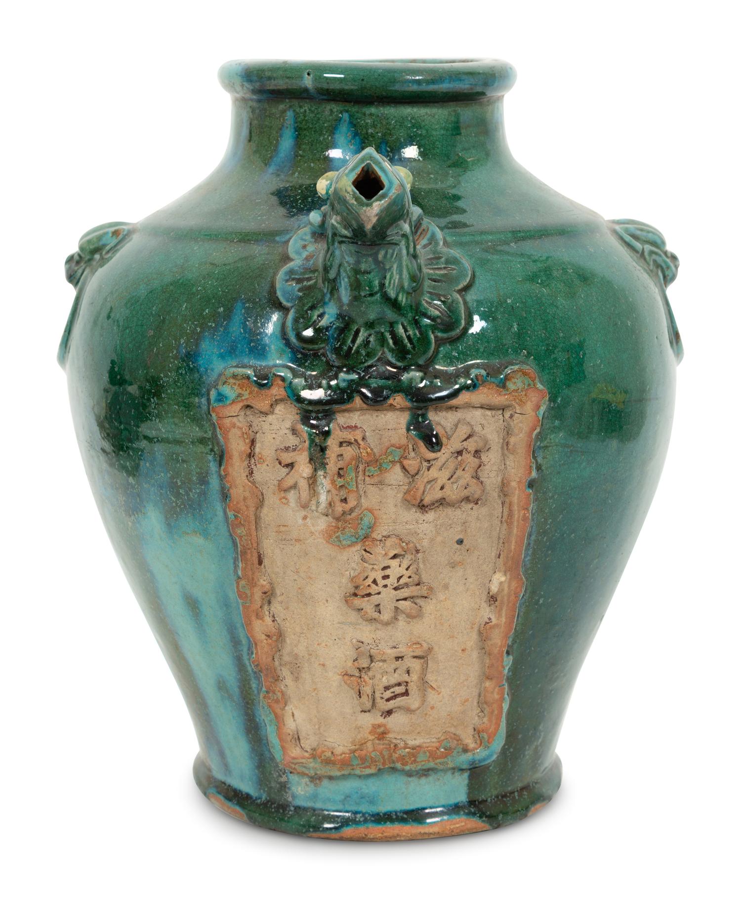 A Chinese Green-Glazed Pottery Ewer