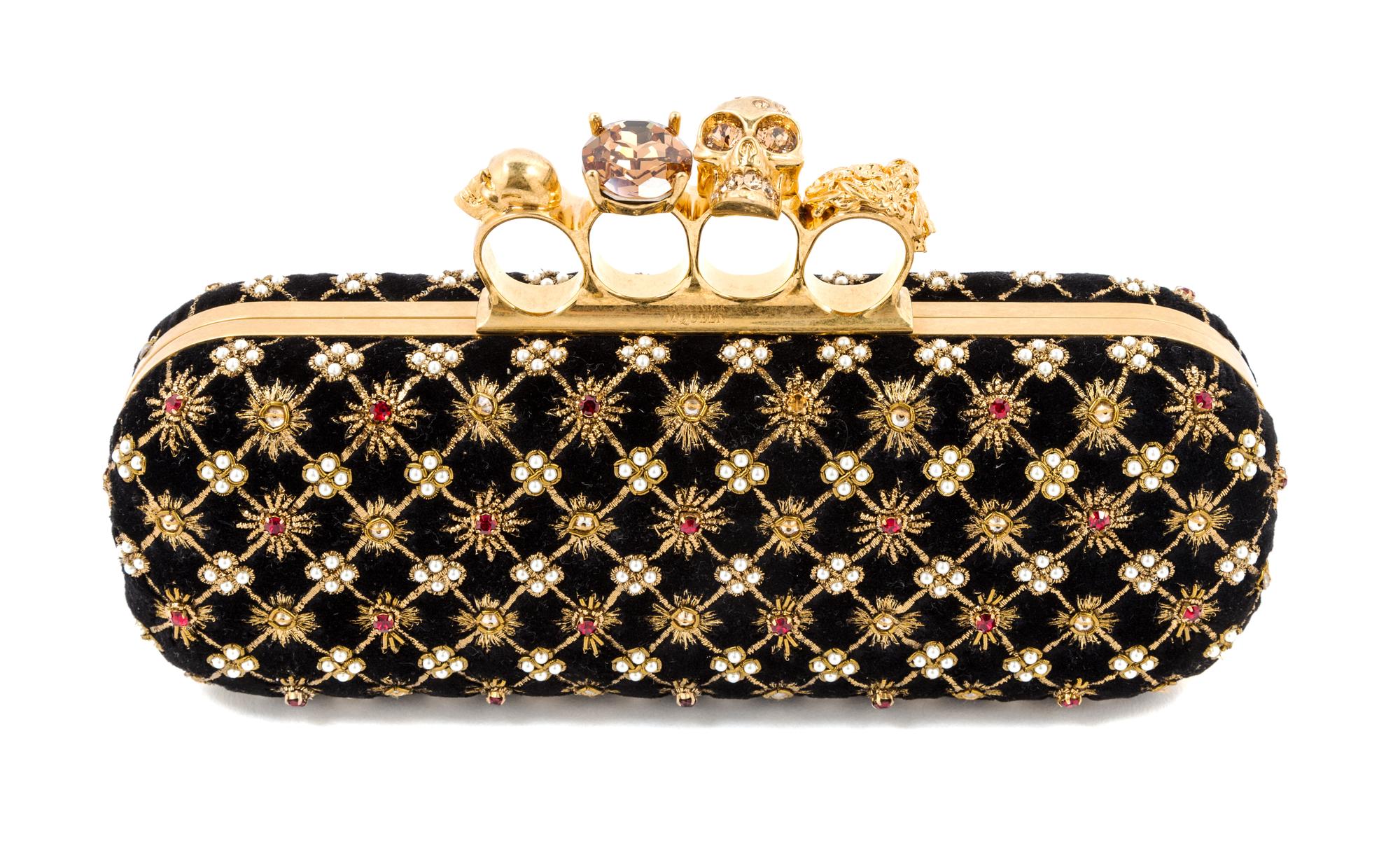 An Alexander McQueen Rhombic Embroidered Knuckle Clutch, 9" x 4" x 2".
