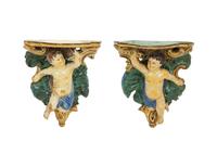 A Pair of Tin-Glazed Earthenware Wall Brackets, and Two Giltwood Wall Brackets