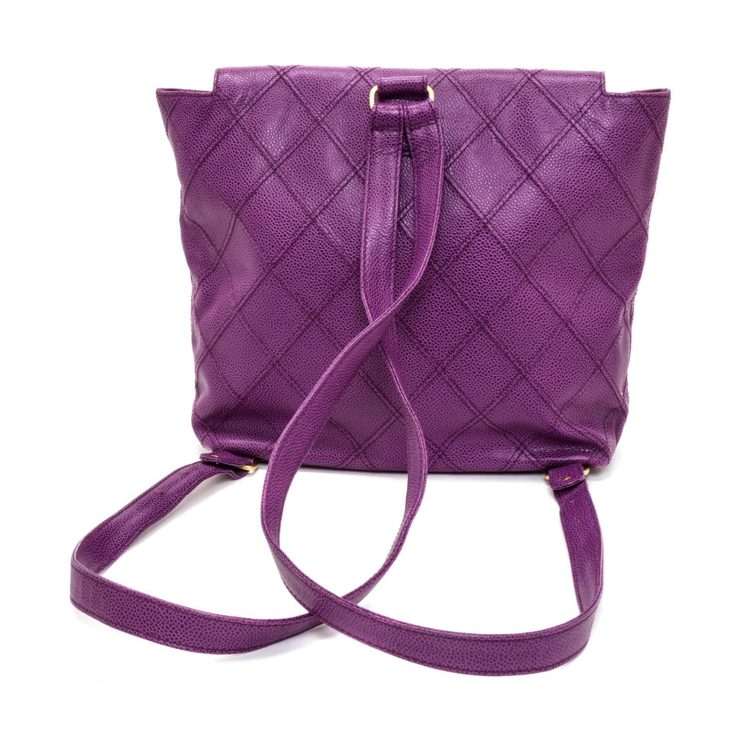 A Chanel Purple Quilted Caviar Leather Backpack, 12" x 10" x 3".