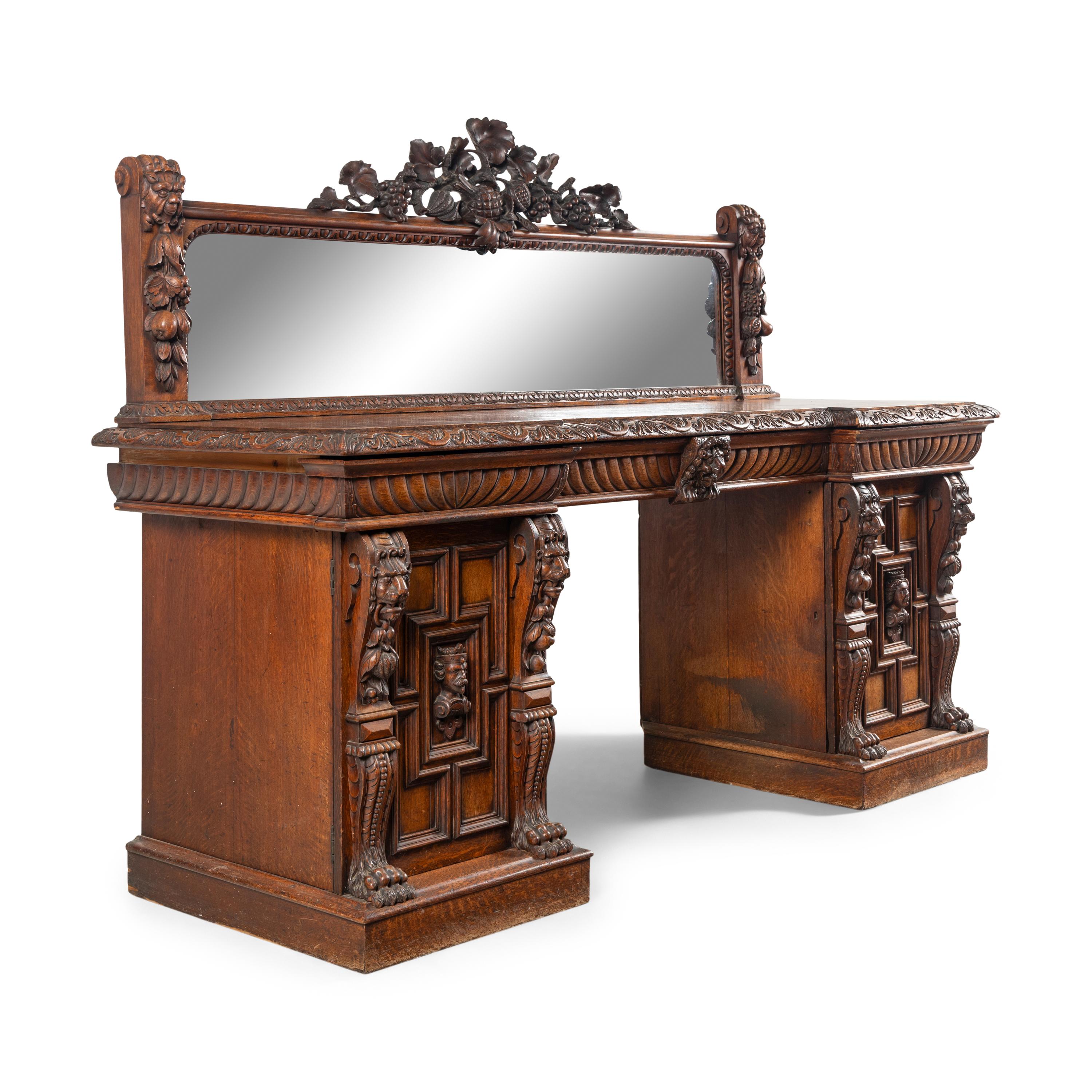 An English Renaissance Revival Carved Oak Serving Table
