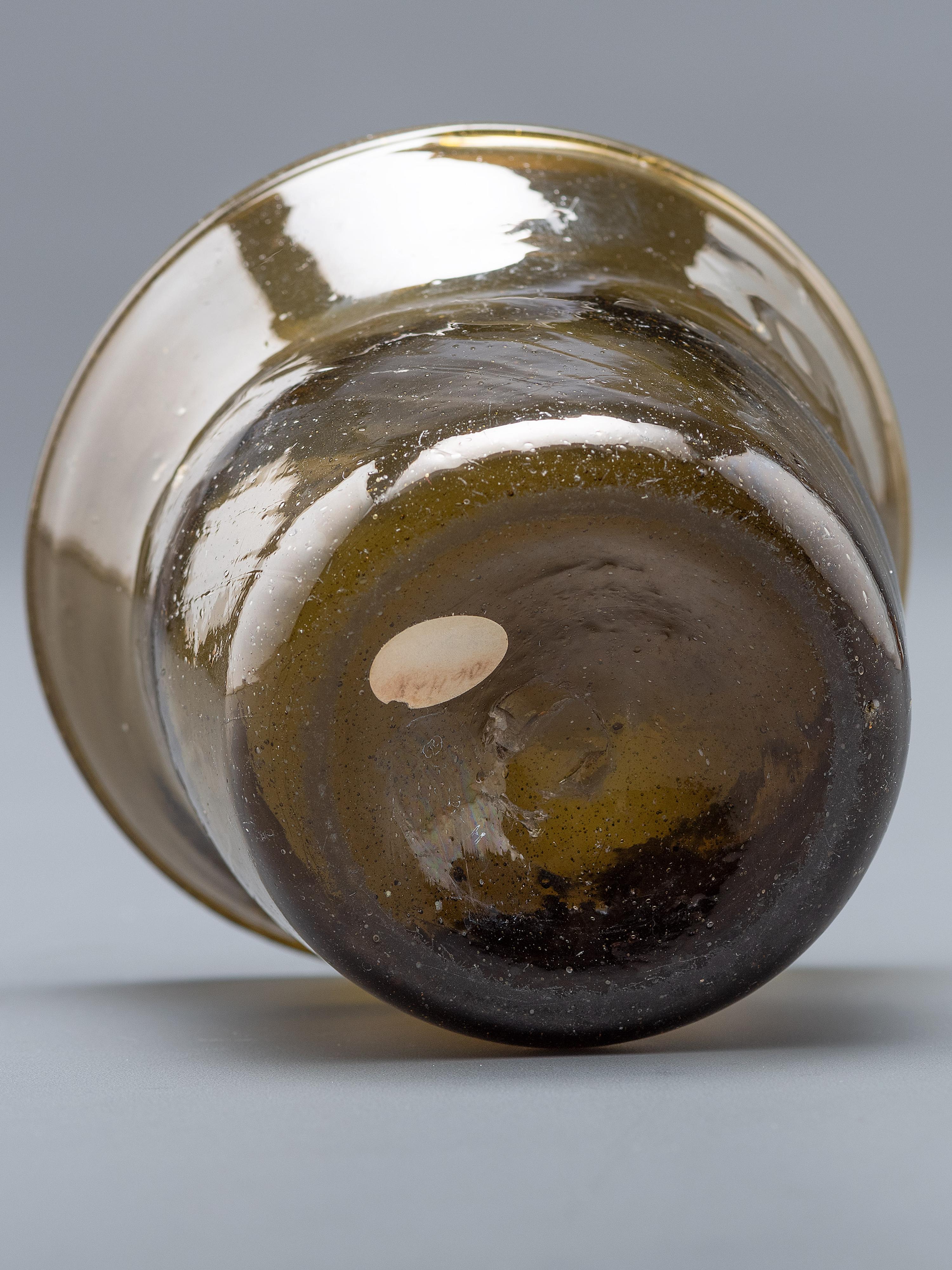 A Blown-Glass Eating Bowl in Olive Green