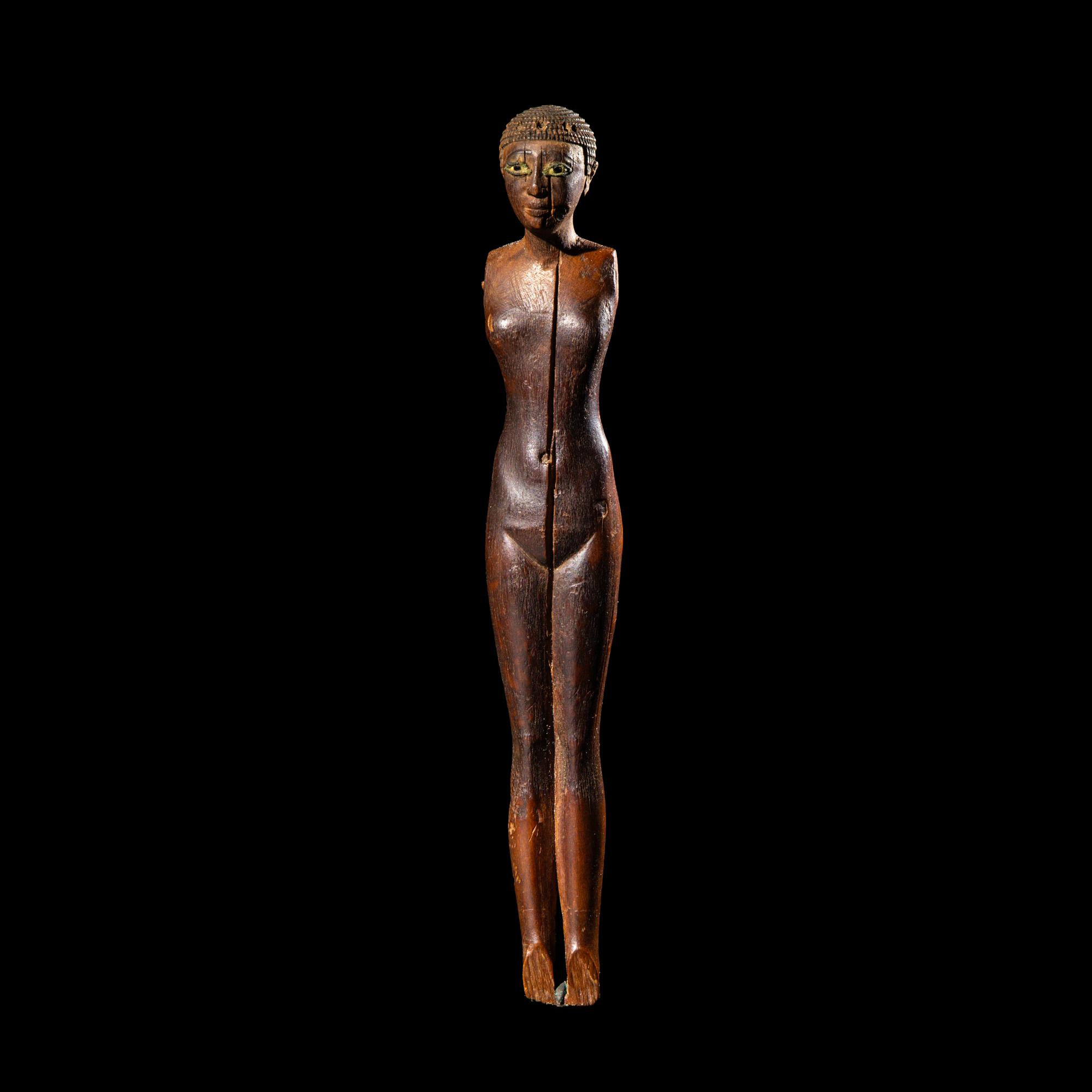 An Egyptian Wood Female Figure