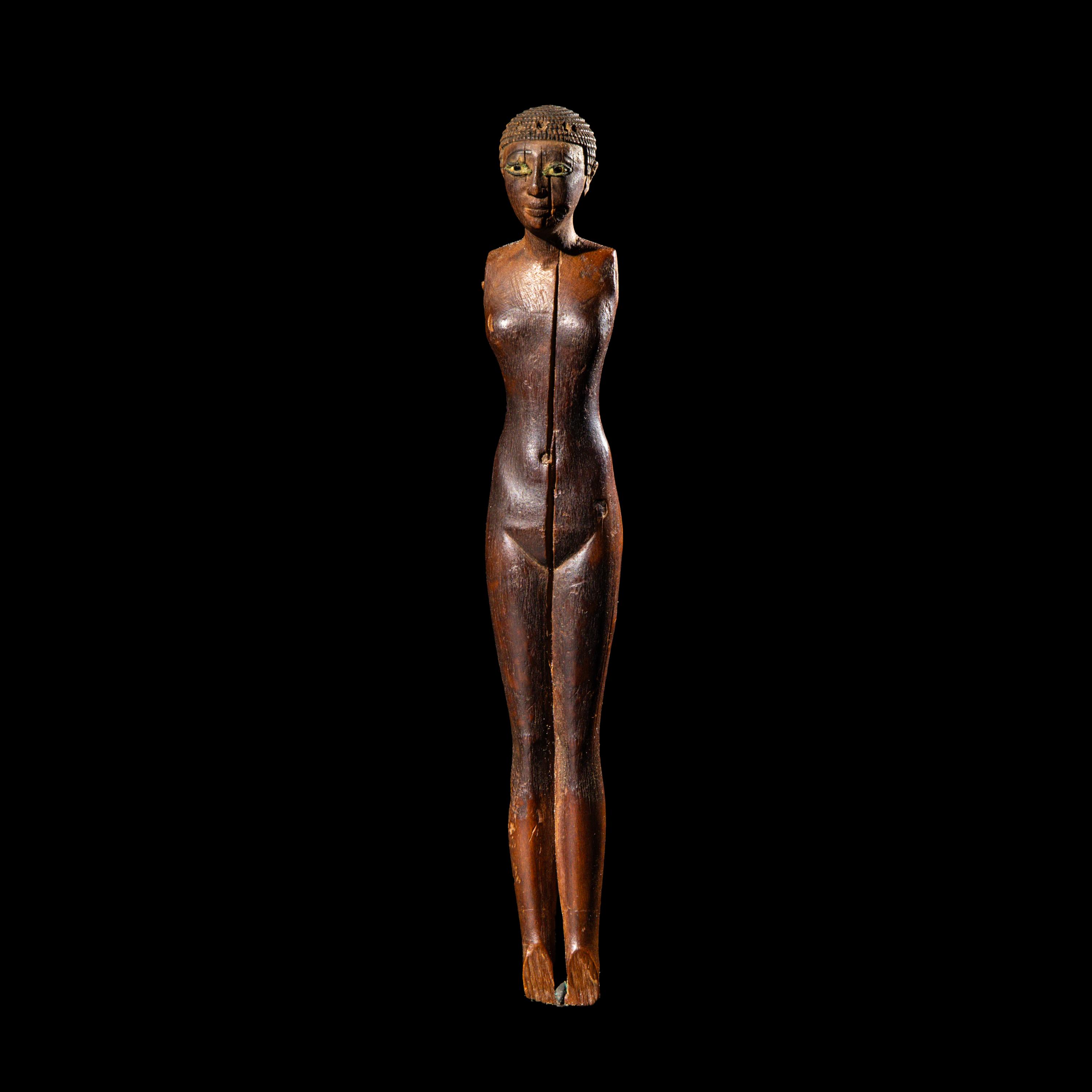 An Egyptian Wood Female Figure