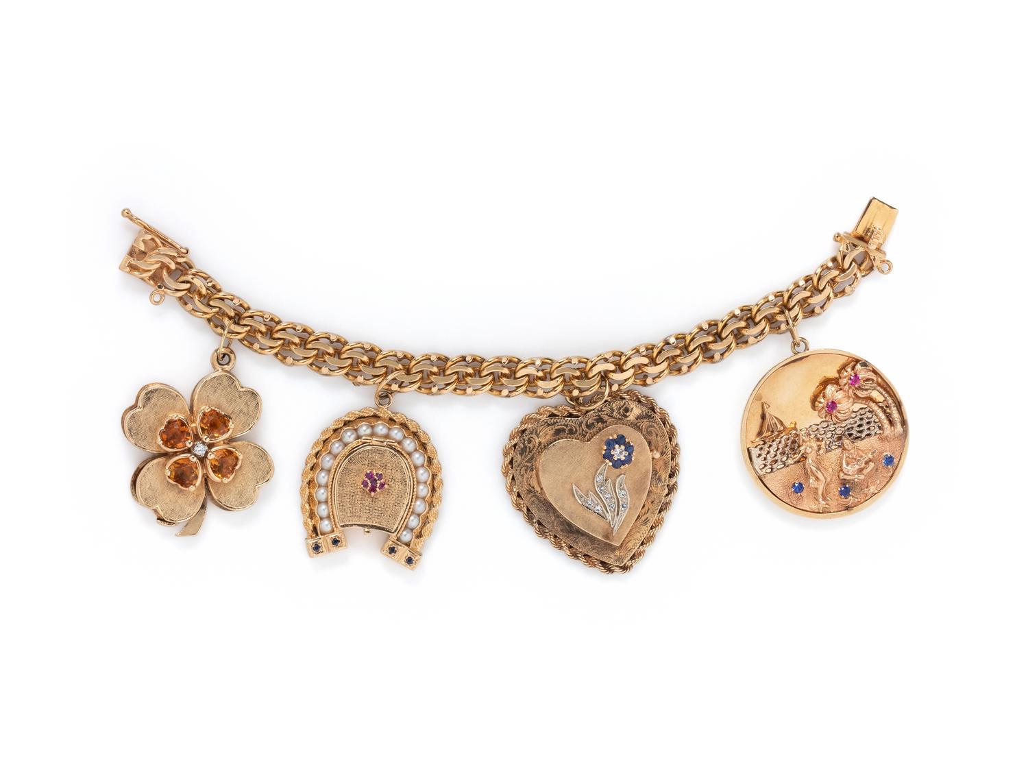 YELLOW GOLD AND GEMSTONE CHARM BRACELET