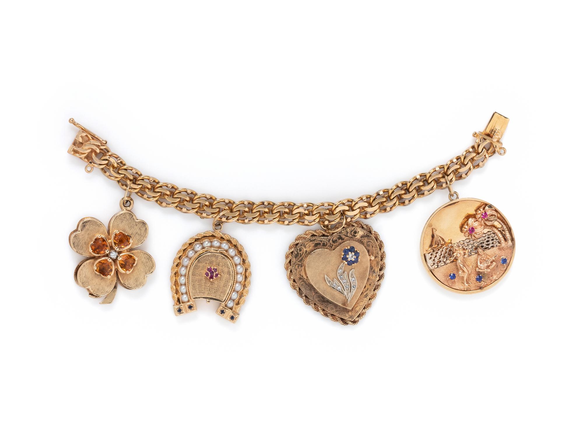 YELLOW GOLD AND GEMSTONE CHARM BRACELET