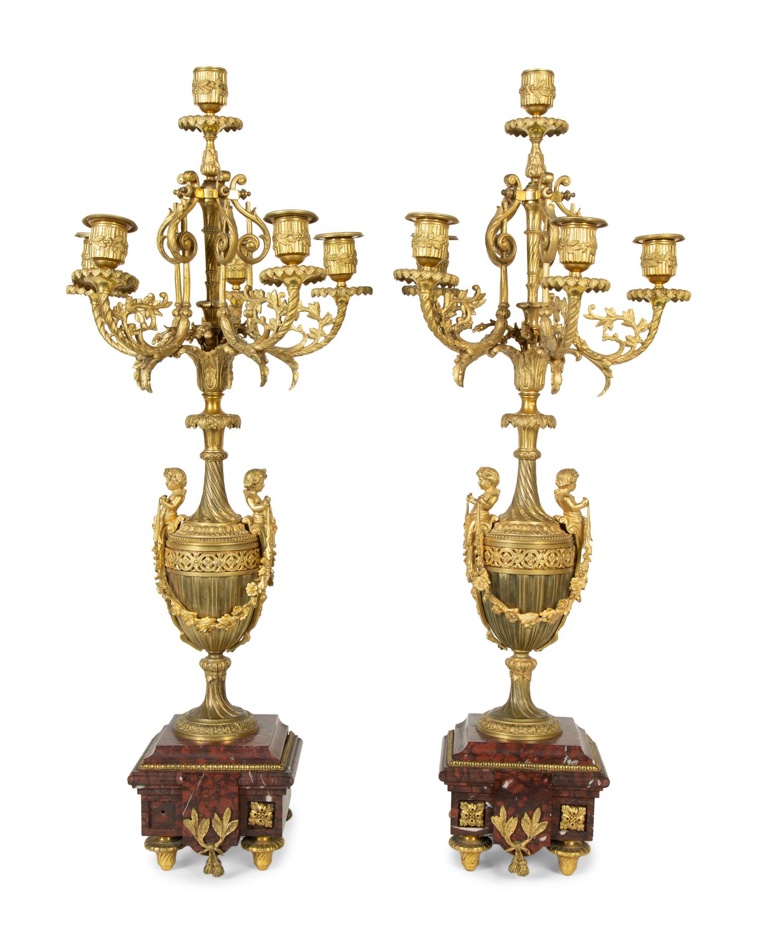 A Pair of French Gilt Bronze and Marble Urn-Form Six-Light Candelabra