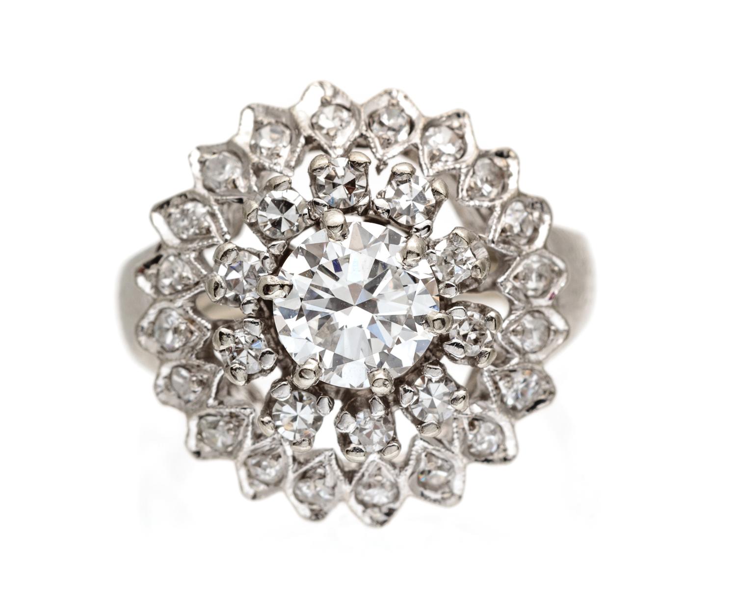 A 14 Karat White Gold and Diamond Ring, 3.70 dwts.