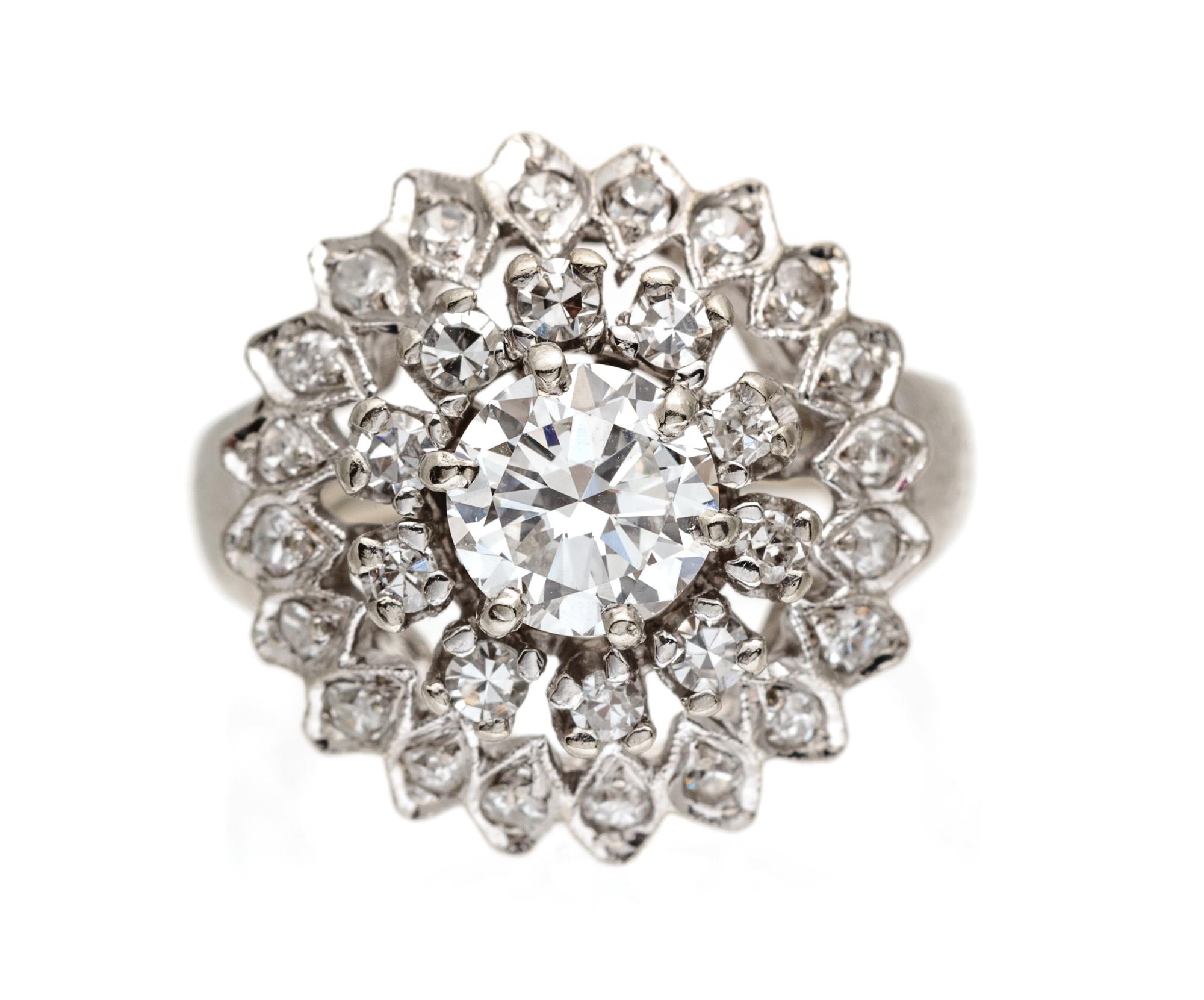 A 14 Karat White Gold and Diamond Ring, 3.70 dwts.
