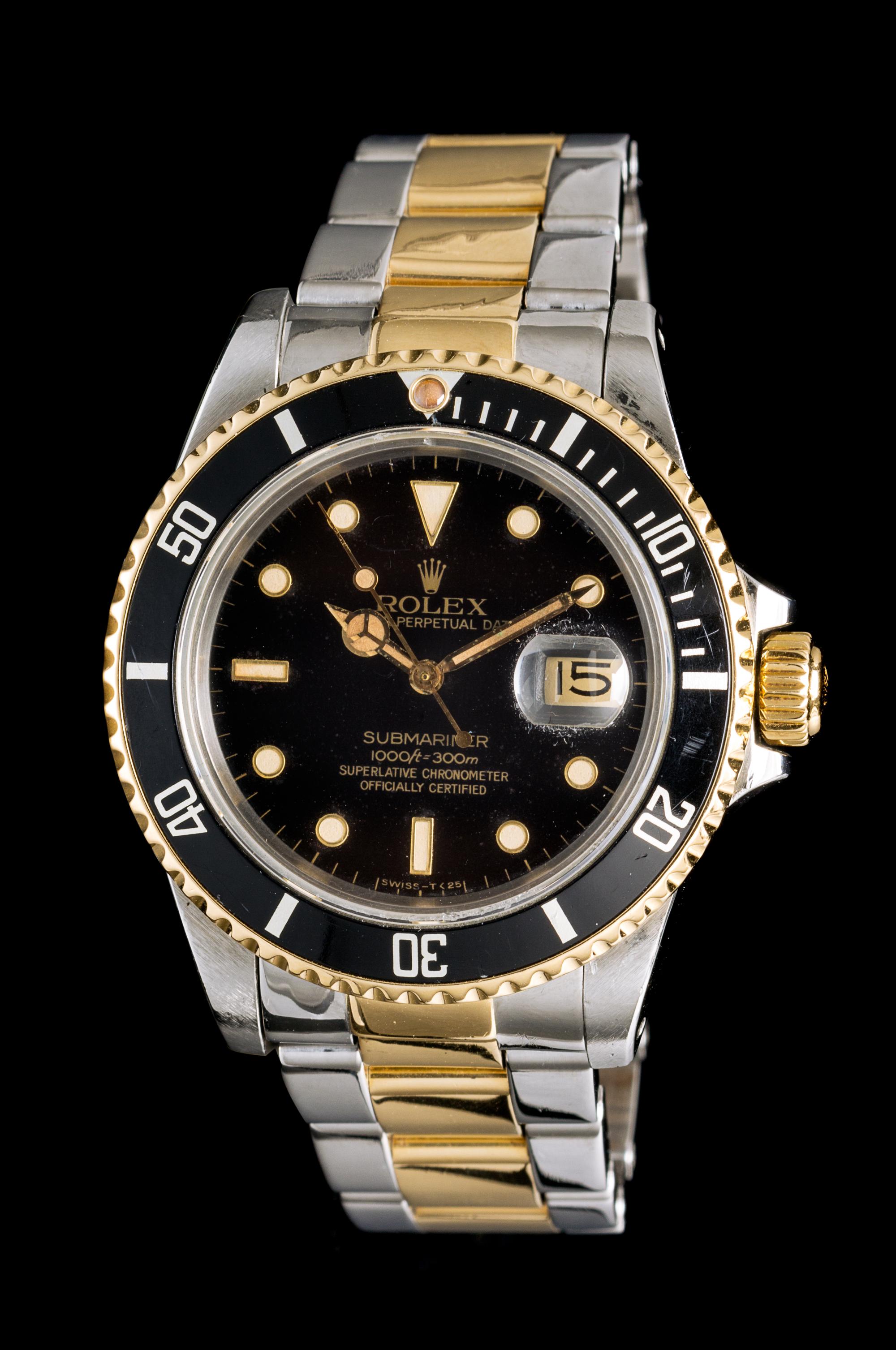 A Stainless Steel and Yellow Gold Ref. 16803 Submariner Wristwatch, Rolex, Circa 1984,