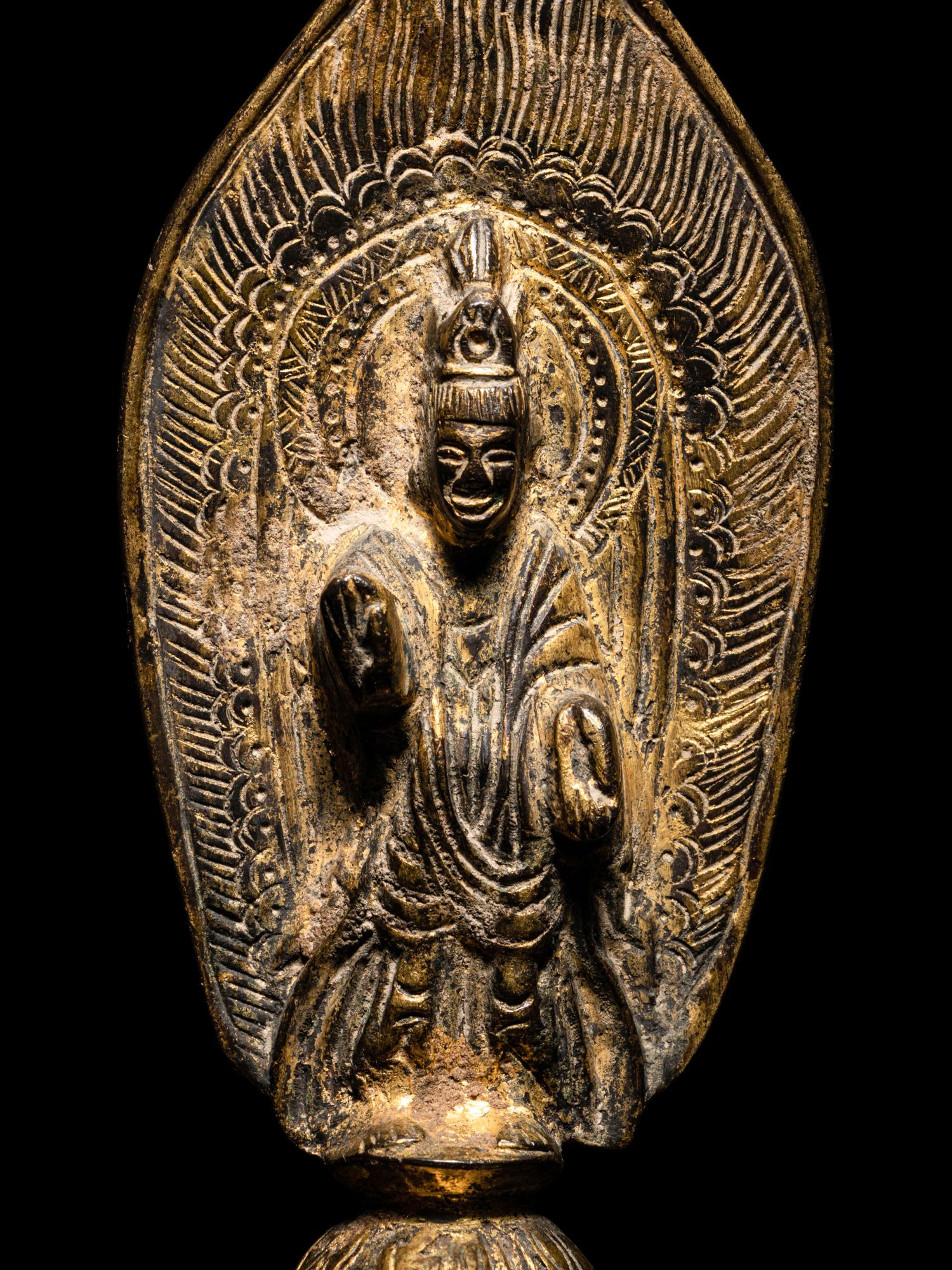 A Gilt Bronze Votive Figure of Standing Buddha